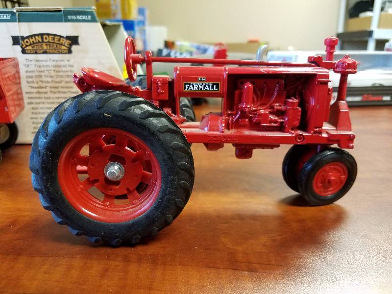 lot 15 image: Farmall diecast Tractor