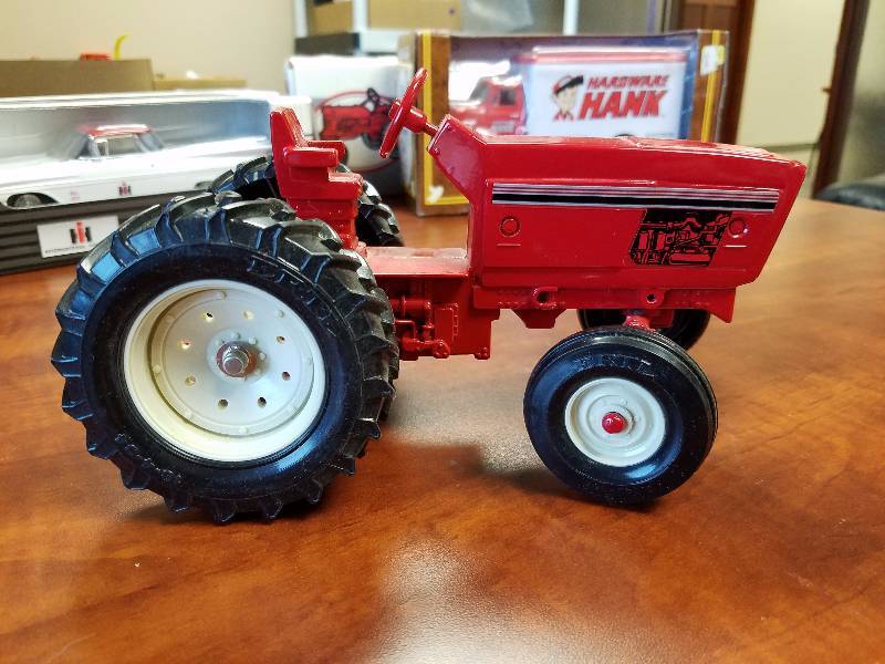 lot 19 image: Red diecast tractor by ERTL