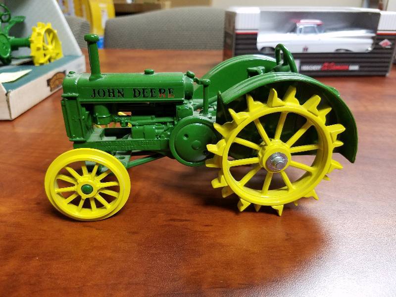 lot 24 image: John Deere wide tread tractor by ERTL