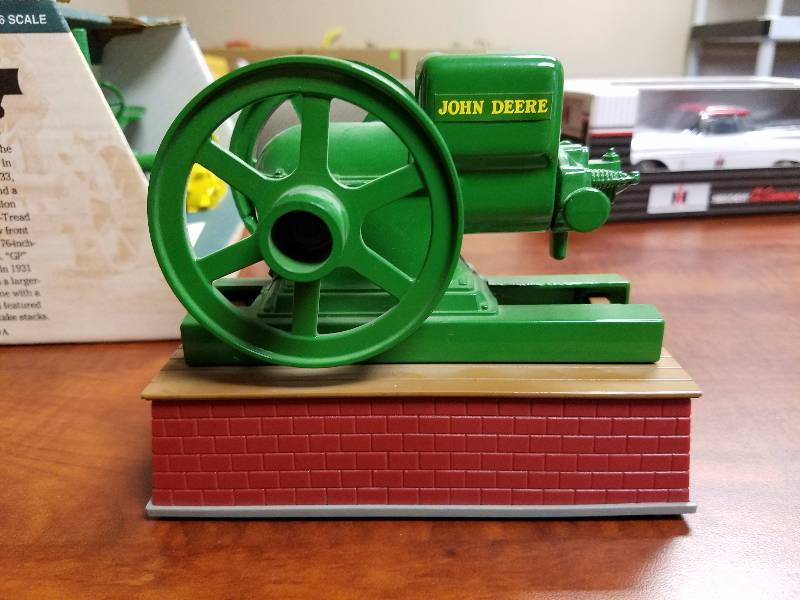 lot 28 image: John Deere hit and miss motor by ERTL