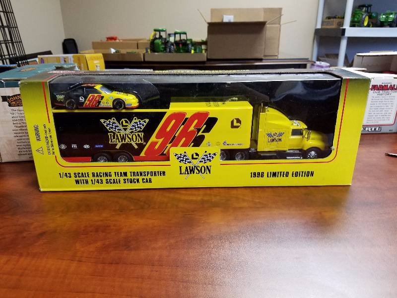 lot 55 image: Lawson racing semi tractor trailer hauler with stock car