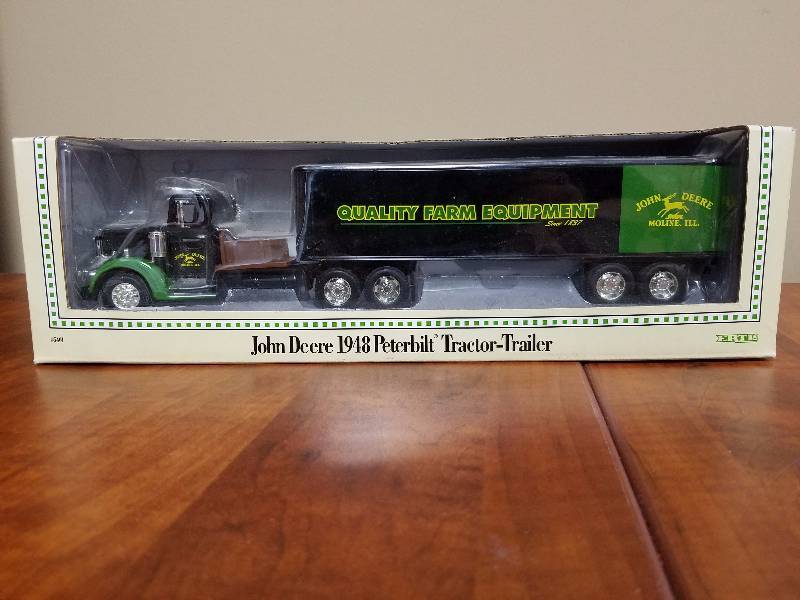 lot 68 image: John Deere 1948 Peterbuilt tractor trailer by ERTL