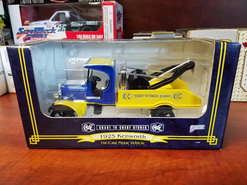 lot 91 image: 1925 Kenworth diecast tow truck by ERTL Coast to Coast