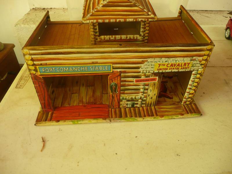 lot 28 image: Marx Tin Litho Fort Comanche Stable