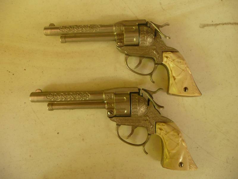 lot 58 image: Vintage Wagon Train Cap Guns - Quick Release