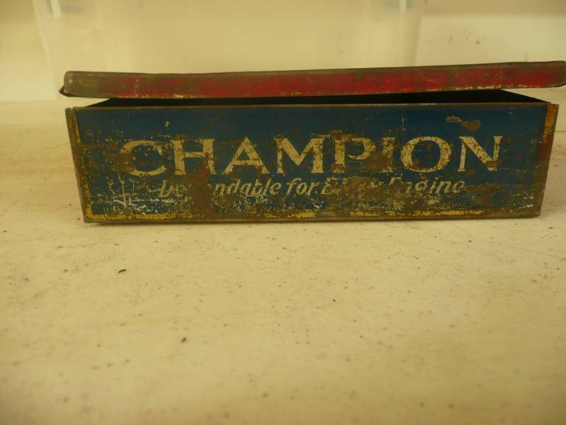 lot 79 image: Vintage Champion Spark Plug Container