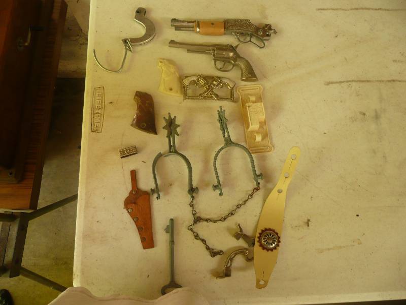lot 85 image: Vintage Misc. Spurs & Guns