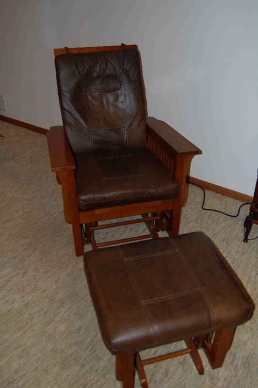 lot 55 image: Glider rocker with foot stool