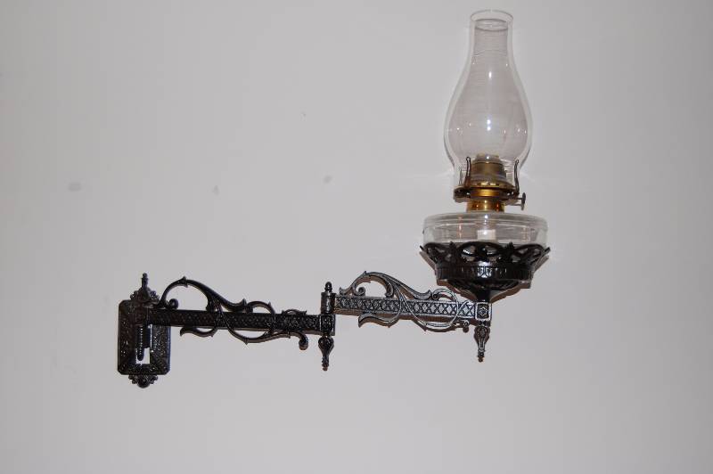 lot 86 image: Wall Mounted Oil Lamp