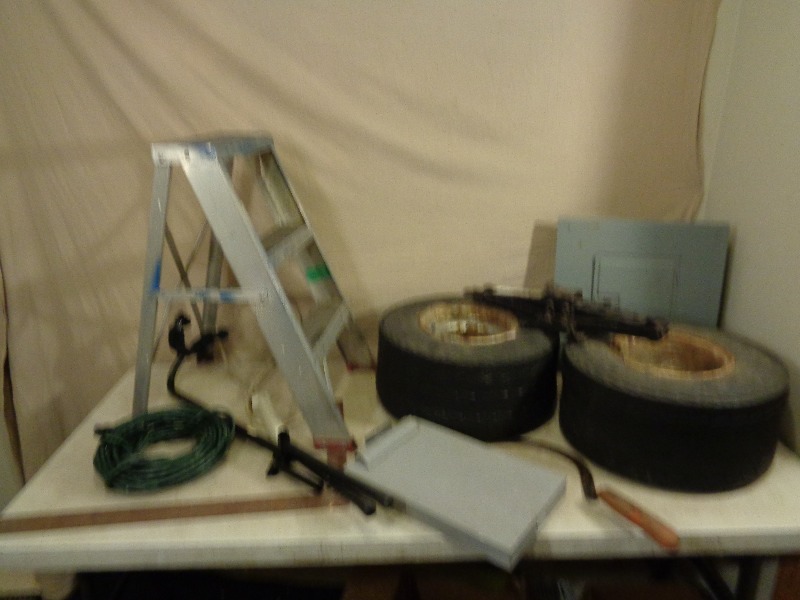 lot 88 image: Golf Cart Tires, Step Ladder, Tools, and More