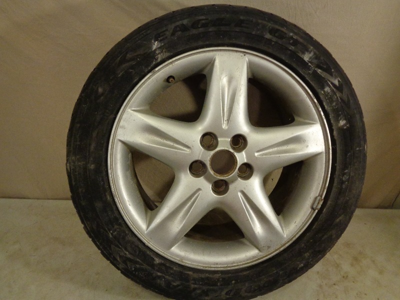 lot 89 image: Tire and 17 Aluminum Wheel