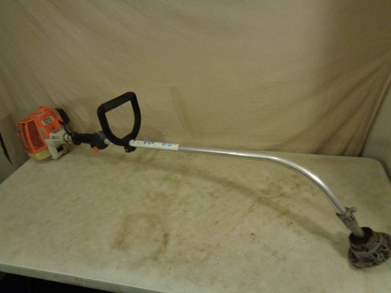 lot 96 image: Stihl FS 75 Weed Whacker  Trimmer