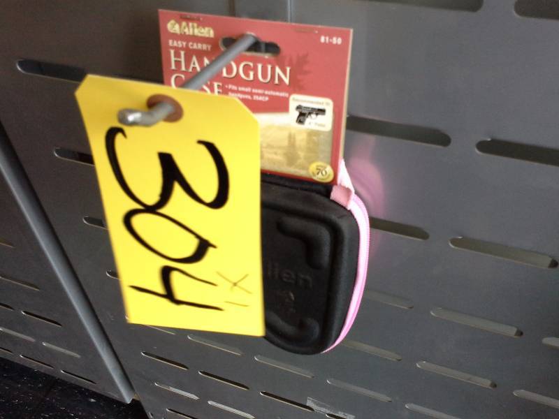 lot 304 image: (1) Pistol Cases, Pink and Black