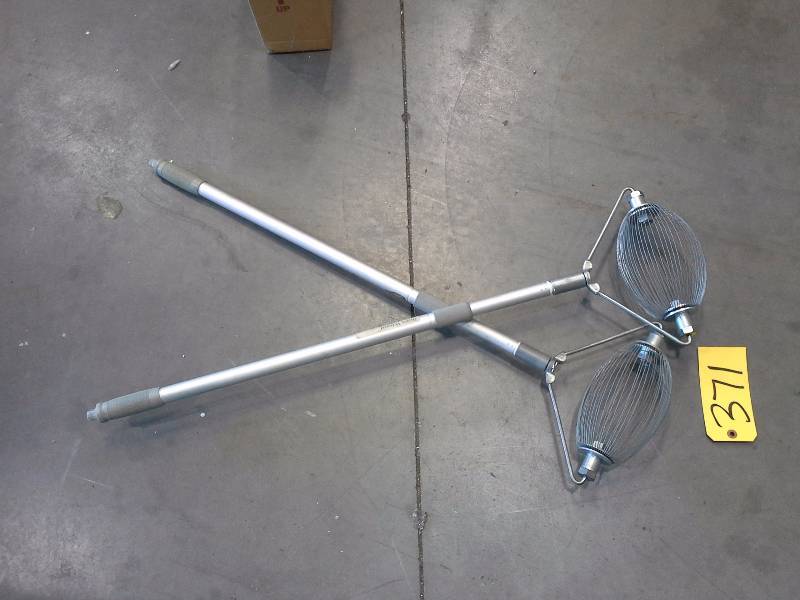 lot 371 image: Pair of Brass Wizard Cartridge Case Pickup Tools