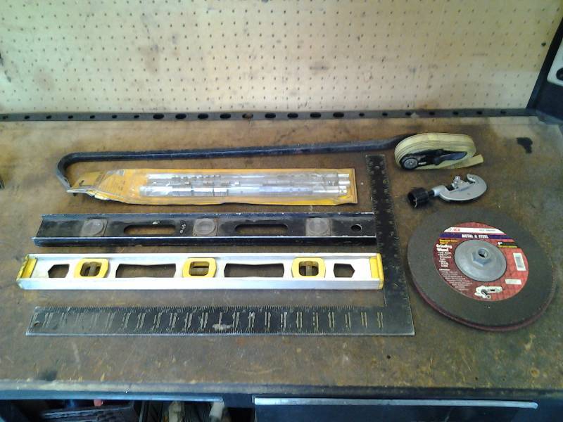 lot 33 image: 2-Levels, Crow Bar, Square, Cutting Disk, Pipe Cutter, Cinch Strap
