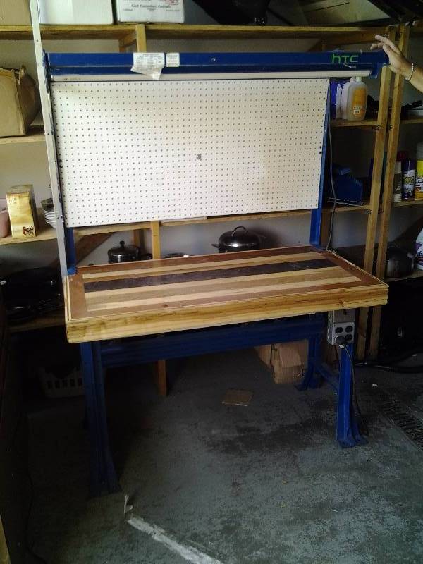 lot 37 image: 4 Foot Work Bench With Upper Frame & Peg Board Back& Quad Multi Plug AC Outlets