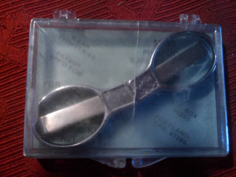 SCISSOR HOLDER AND MULTIPLE CUTTING TOOLS