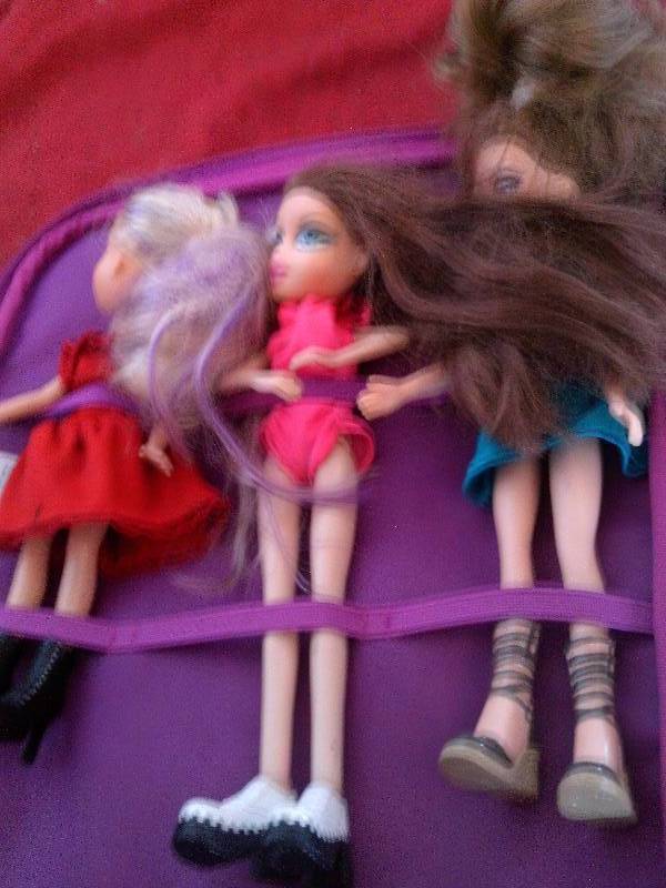 BRATZ DOLLS WITH WHEELED CASE