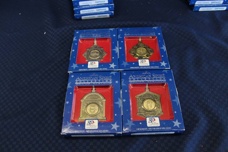 lot 372 image: Lot of (4) Hallmark America Spirit Collection 50 State Quarters Including Georgia, New Jersey, Pennsylvania, Delaware