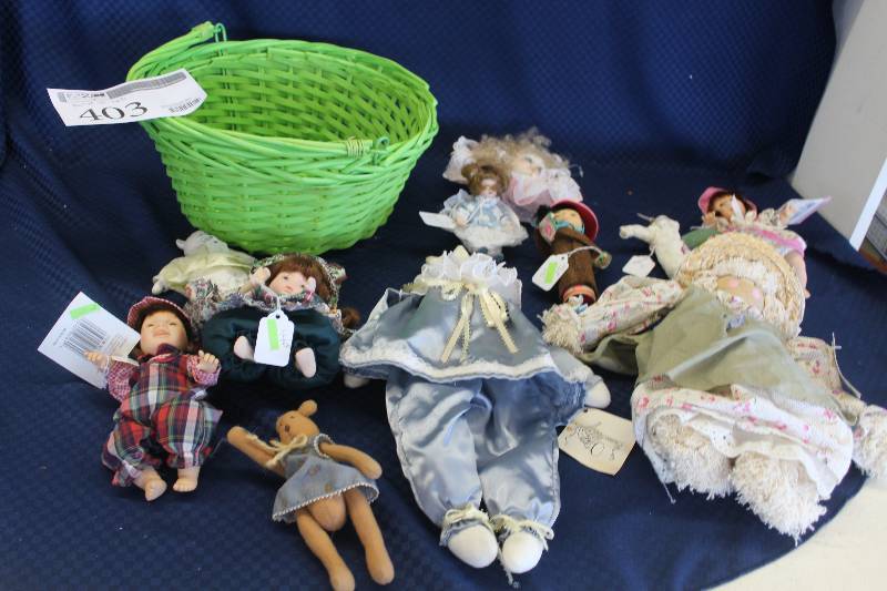 lot 403 image: Basket Lot of Dolls