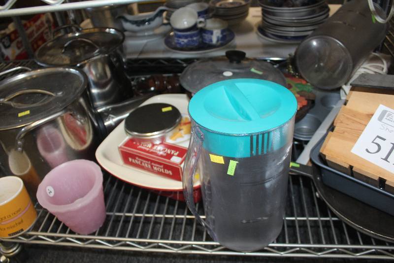 lot 512 image: Shelf Lot of Kitchenware Including Pitchers, Pots, Pans, Skillets, Cups, Trays, And More