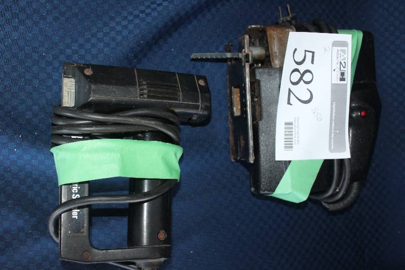 lot 582 image: Lot of (2) Power Tools Including 1) Sears Craftsman 14hp 58 Stroke Variable Speed Sabre Saw AND 1) Staple Gun