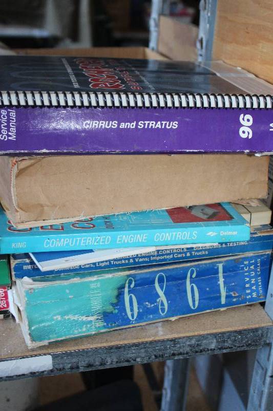 lot 590 image: Lot of (8) Vintage Automotive Manuals
