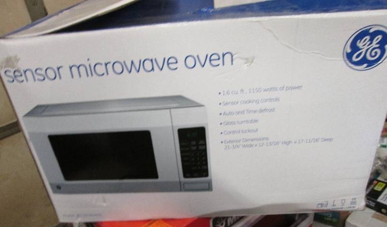 GE 1.6 cu. ft. Countertop Microwave...