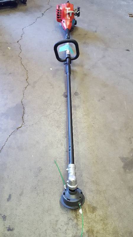 Homelite 2-Cycle 26 cc Straight Shaft Gas Trimmer in like New working conditions