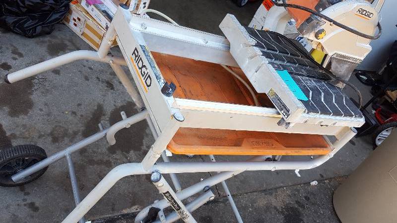 Ridgid 10 in. Wet Tile Saw with Stand used in working conditions Model # R4092