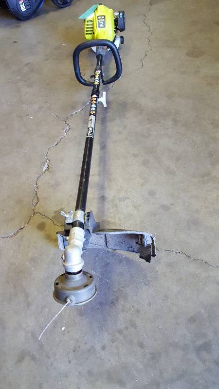 Ryobi 2-Cycle 25cc Gas Full Crank Straight Shaft String Trimmer in like New working conditions
