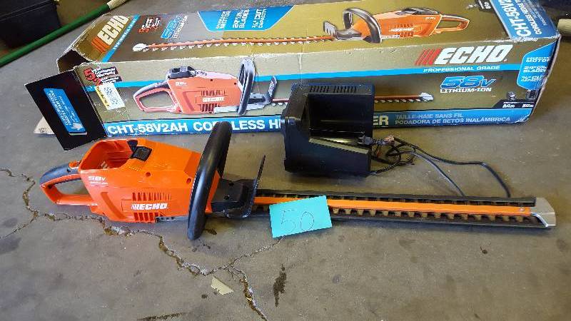 Echo 24 in. 58-Volt Lithium-Ion Brushless Cordless Hedge Trimmer Model # CHT-58V2AH in working conditions