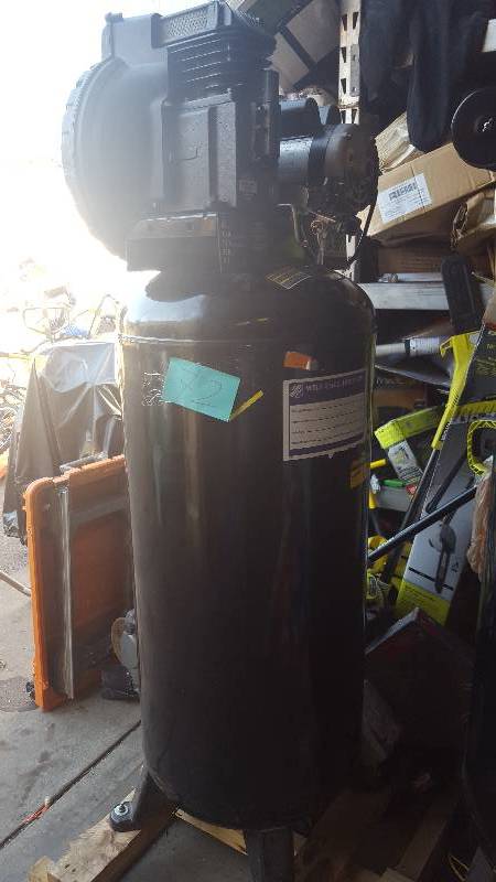 Husky 60 Gal. Stationary Electric Air Compressor - 220 Volt looks in like new condtion
