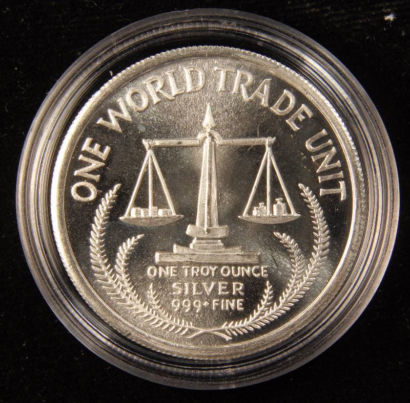 1 TROY OZ. .999 FINE SILVER ROUND 1985 ONE WORLD TRADE UNIT IN AIRTITE