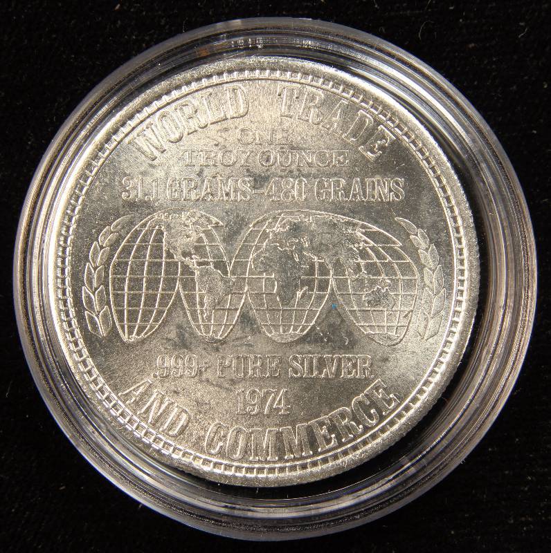 1 TROY OZ. .999 FINE SILVER ROUND UNITED STATES SILVER CORPORATION WORLD TRADE AND COMMERCE DESIGN IN AIRTITE