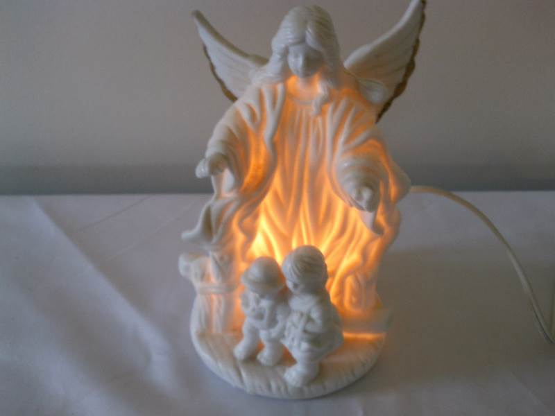 lot 13 image: Lighted guardian angel figurine