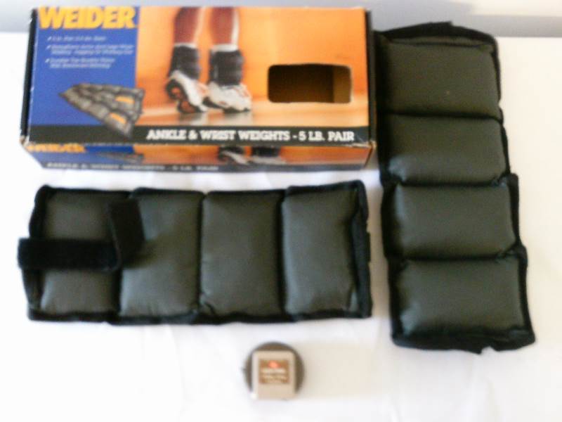 lot 28 image: Weider ankle and wrist weight set with pedometer
