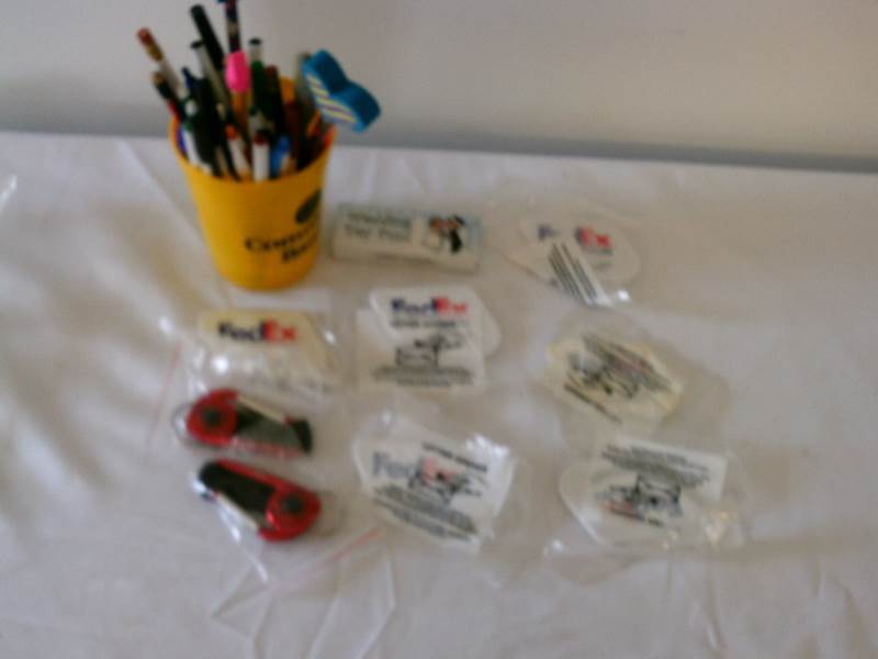 lot 50 image: Office lot (pens, Fed Ex Letter opener, clips)