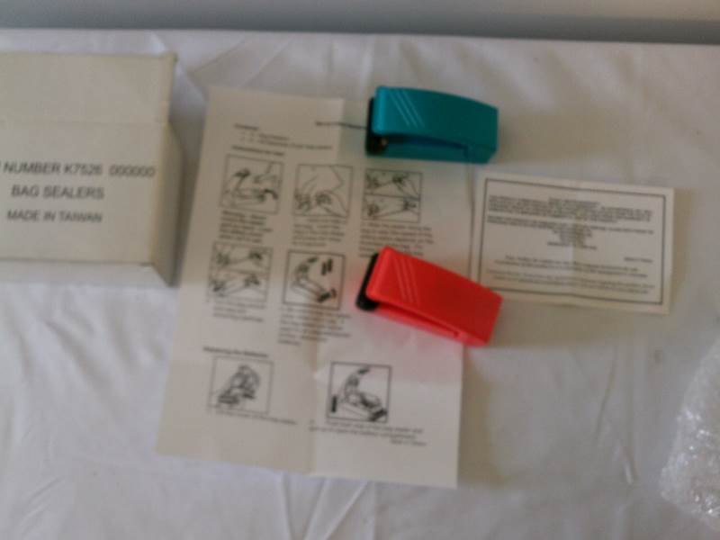 lot 51 image: Bag Sealer hand held, factory box. appear to be new.