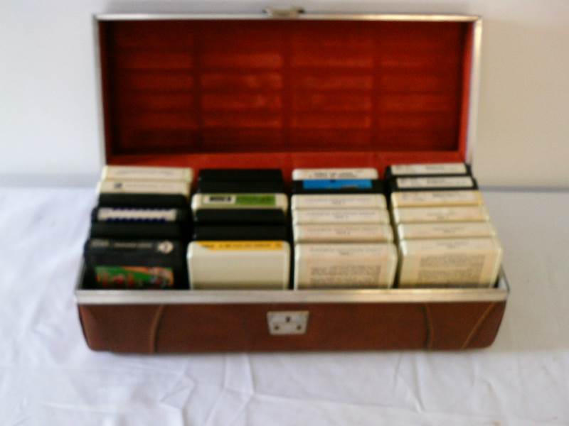 lot 86 image: 8 track case with tapes ( lot of 24)