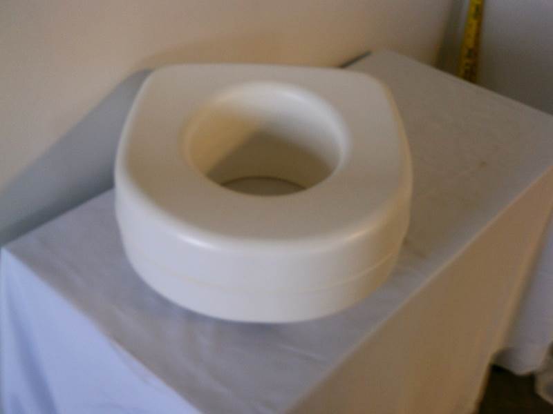 lot 93 image: Elevated Toilet Seat by Rubbermaid
