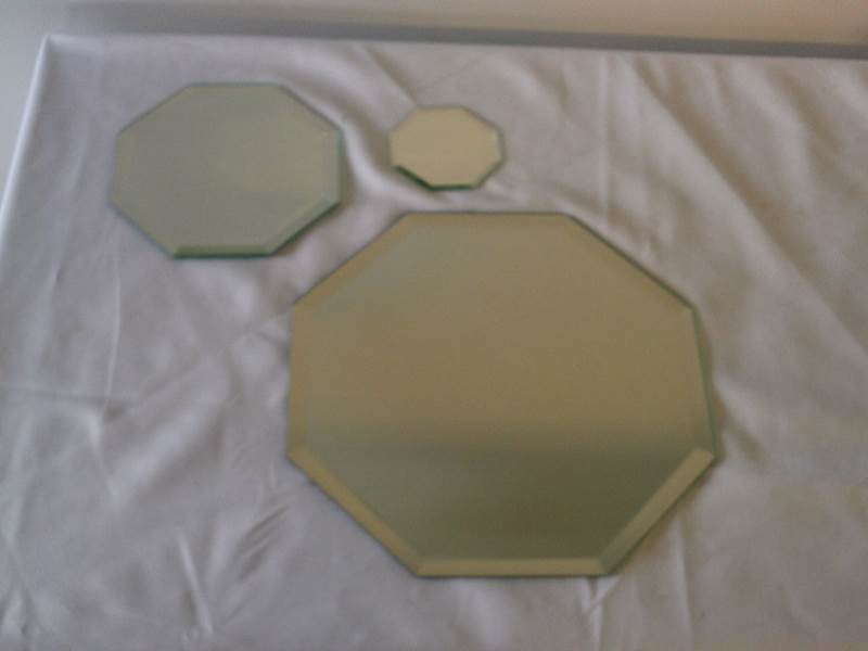 lot 98 image: Octagon Beveled Accent Mirrors (lot of 3)