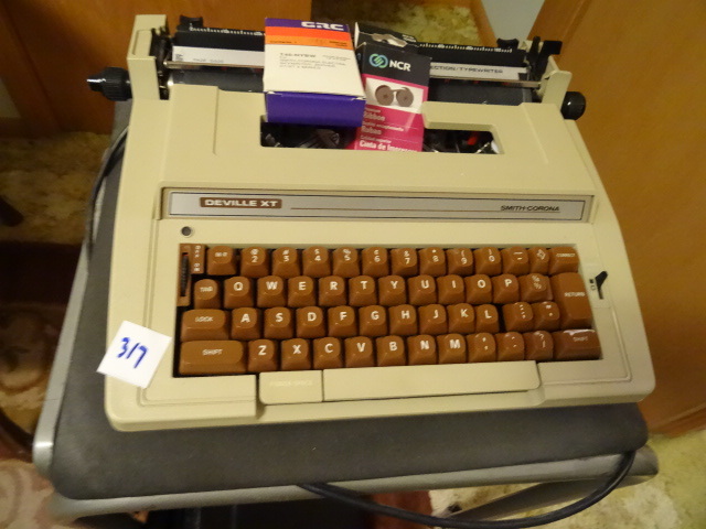 Typewriter with Stand and Case.
