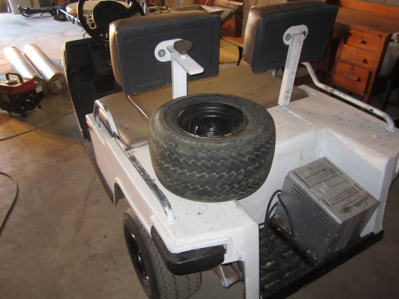 lot 12 image: Melex golf cart with charger, runs,...