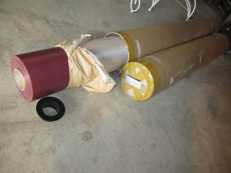 lot 18 image: 2 rolls of burgundy banner making m...