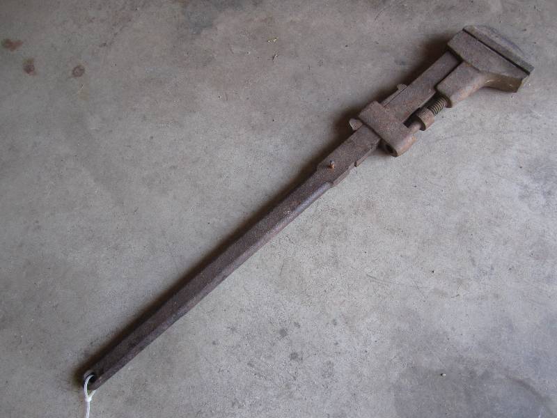 lot 43 image: Vintage iron wrench, need lubricati...