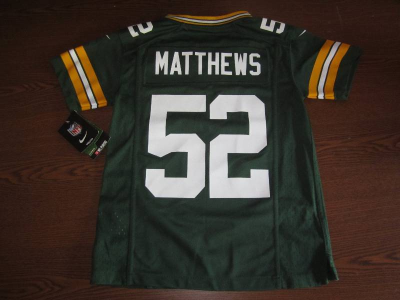 lot 73 image: New Youth S Packers Jersey...