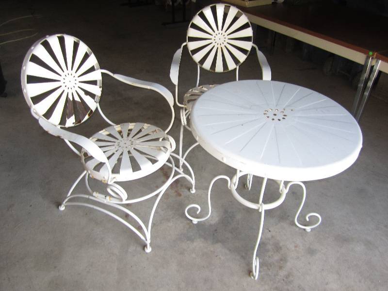 lot 78 image: Vintage metal table and chairs...