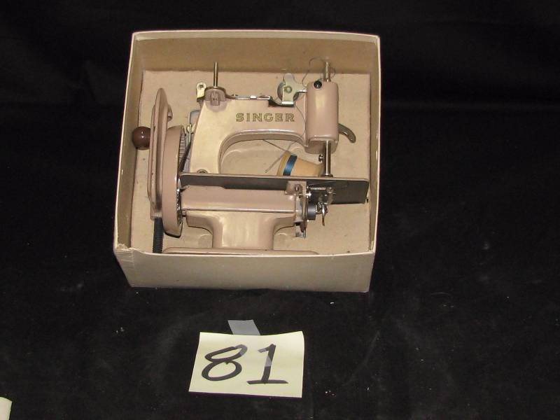 lot 81 image: Singer Sewhandy Childs Sewing Machine