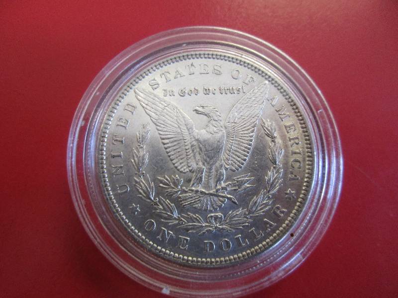 Lot #16 - 1885-P Morgan Silver Dollar in BU Condition. Cartwheel effect and original mint luster are readily visible.